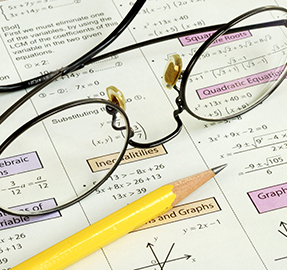 math paper and glasses